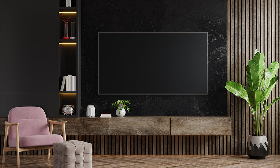 Decor zone tv unit with wooden panelling, lighting and solid texture ensures the eye-catching decor.