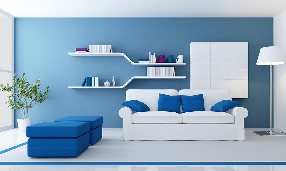 The living room has unique floating shelves that appeal to the interior and the best space-saving living room idea.