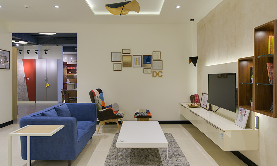 Indian modern living room design that has a cue from traditional Indian elements and a modern twist in HSR layout