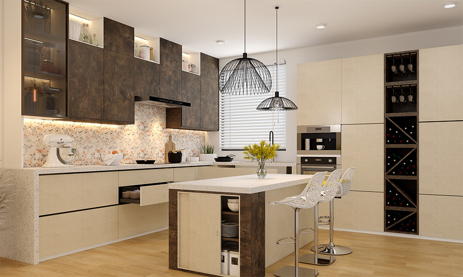 Indian modular kitchen interior designed in island layout with breakfast counter and wine rack lends lavishly.