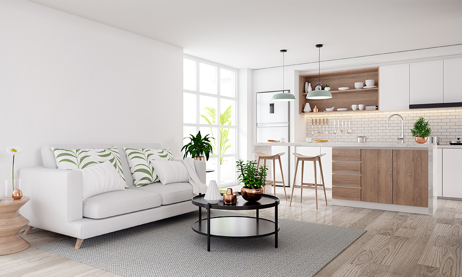 White living cum open kitchen area in mid-century modern interior style with minimal furniture looks clean and chic.