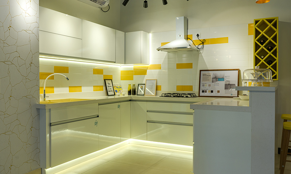 A Modern kitchen interior design layout with cabinets and breakfast in HSR layout experience centre