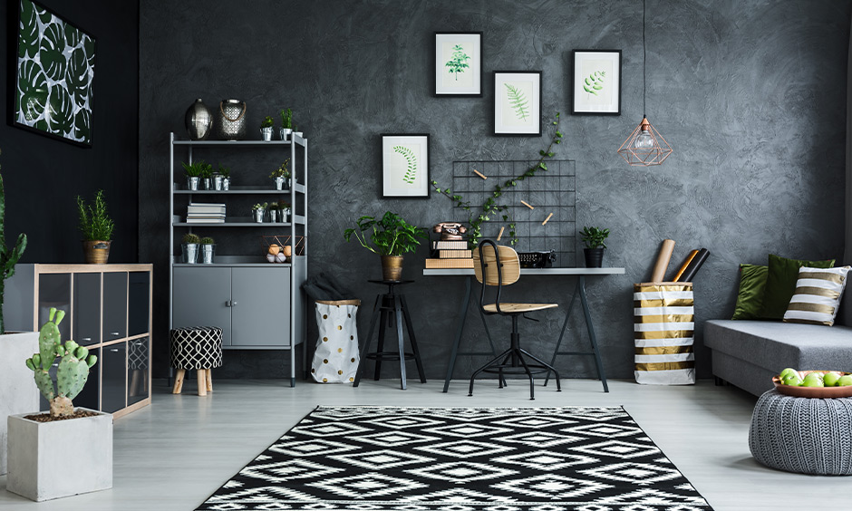 Modern Scandinavian living room with grey wallpapers, indoor plants and wooden furniture brings a classic look.