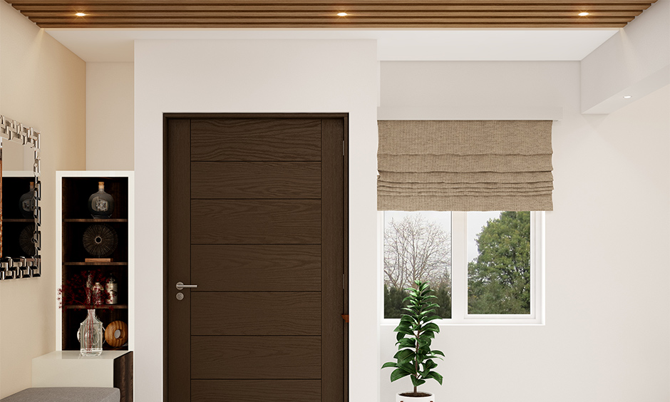 Panelled down ceiling design for lobby to introduce earthiness