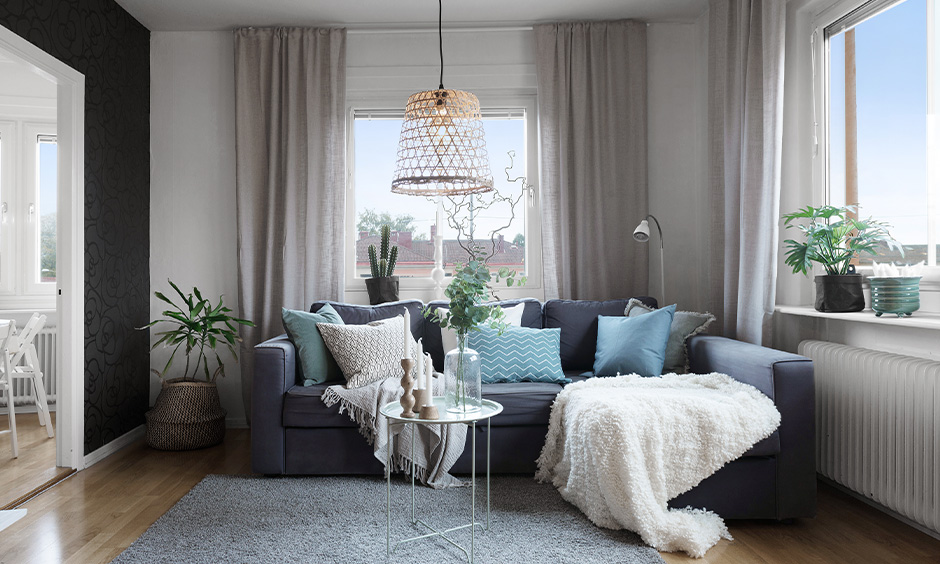 Scandinavian design living room with furniture and indoor plants accentuate the beauty of the living room.