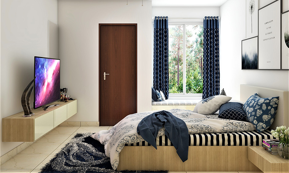 Sliding window glass design in the bedroom with a window seat area brings a homely and cheery vibe.