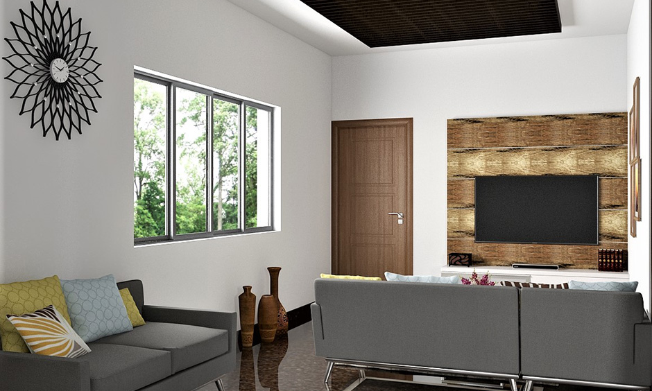 A small white living room with a sliding window glass design brings a luxurious and bold vibe.