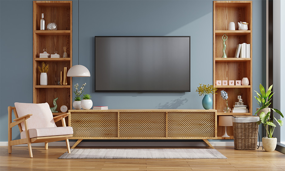 The living room has a Tv unit made from natural wooden textures is the best interior decoration for the TV unit.