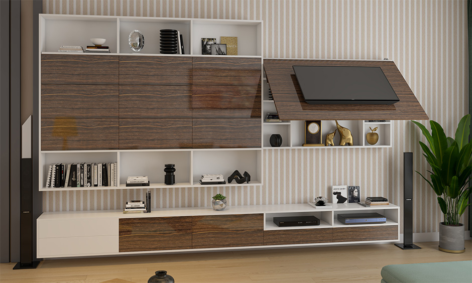 A wall-mounted tv unit with a mixture of open and closed cabinets is the best space-saving living room furniture.