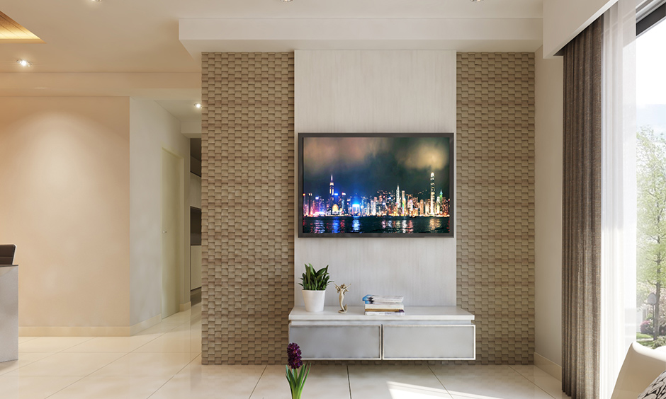 Minimal tv unit decoration with texture background and all-white TV unit acts as the shield for wiring around the unit.