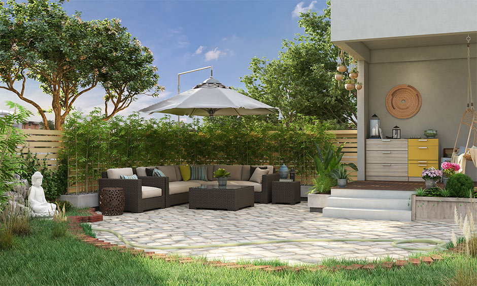 Backyard garden design with a large seating area and center table.