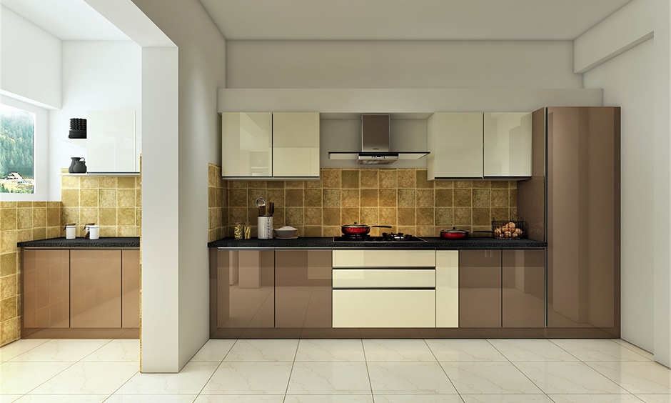 Kitchen accent wall colour in off white with brownish cabinets and gold finish backsplash adds bold and glamorous statement.