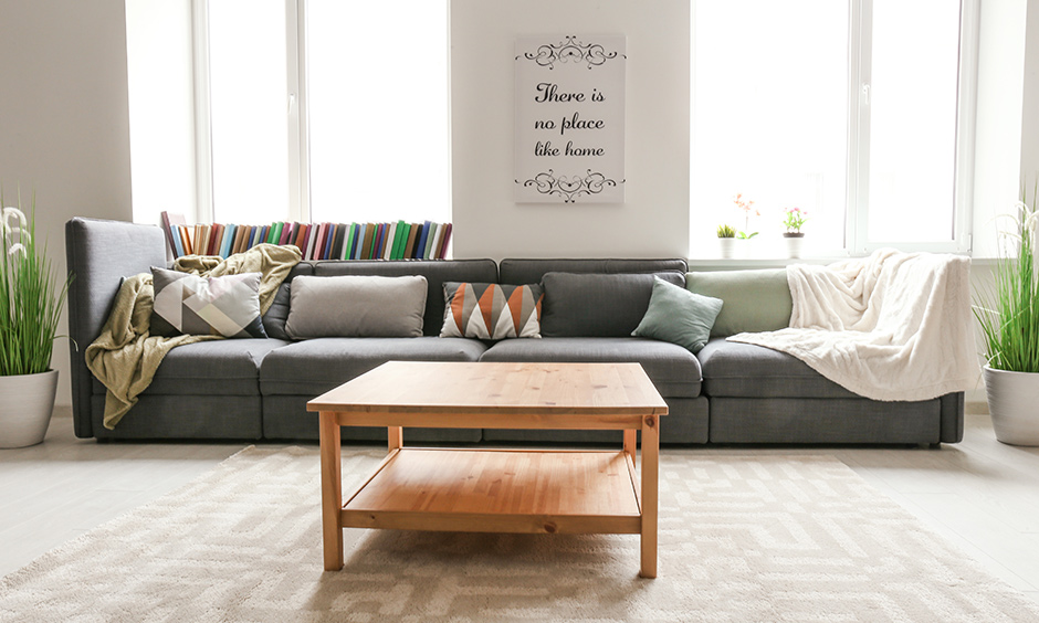 Large sectional sofa in grey colour with comfortable upholstery to make the perfect ‘Read A Book’ set-up