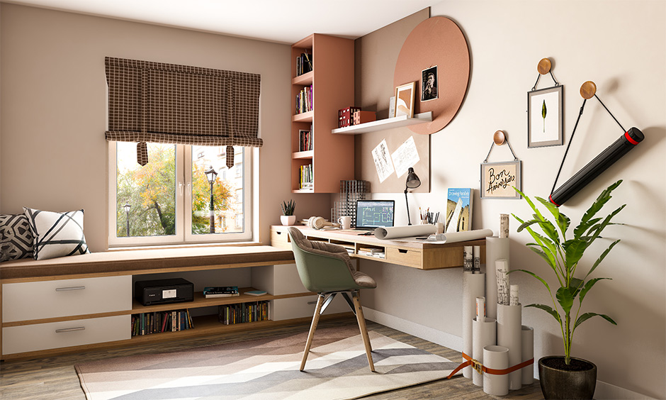 The girls' study room has a bookshelf, wall-mounted shelves, and seating beside the window is a perfect cosy study nook.