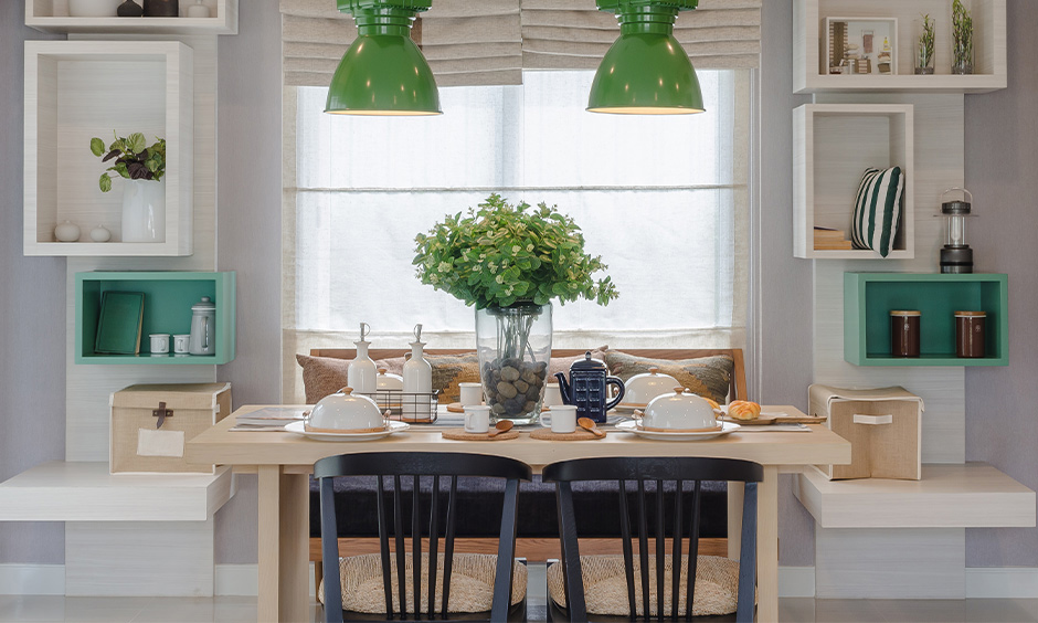 Space-saving furniture dining table with wall-mounted bench design suitable for tiny homes and looks sleek.