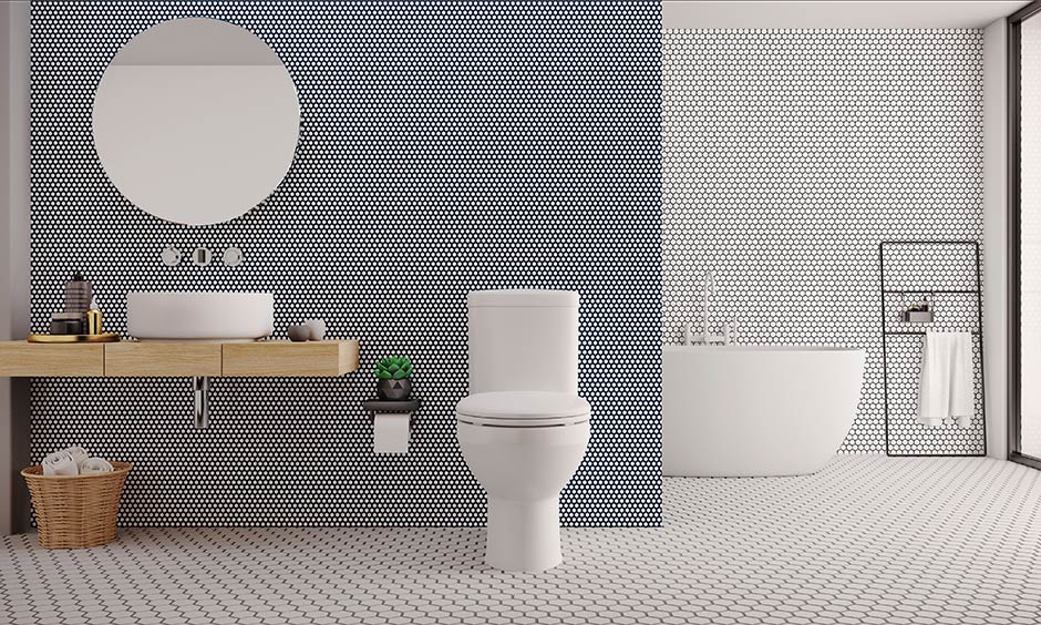 Bathroom tiles trends, A bathroom with tiles in distinct geometric shapes transforms the look of the area.