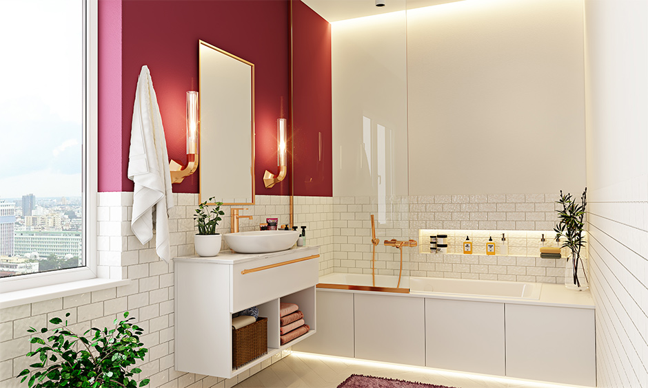 Bathroom wall decor by using golden accessories and lights to bring a luxurious vibe