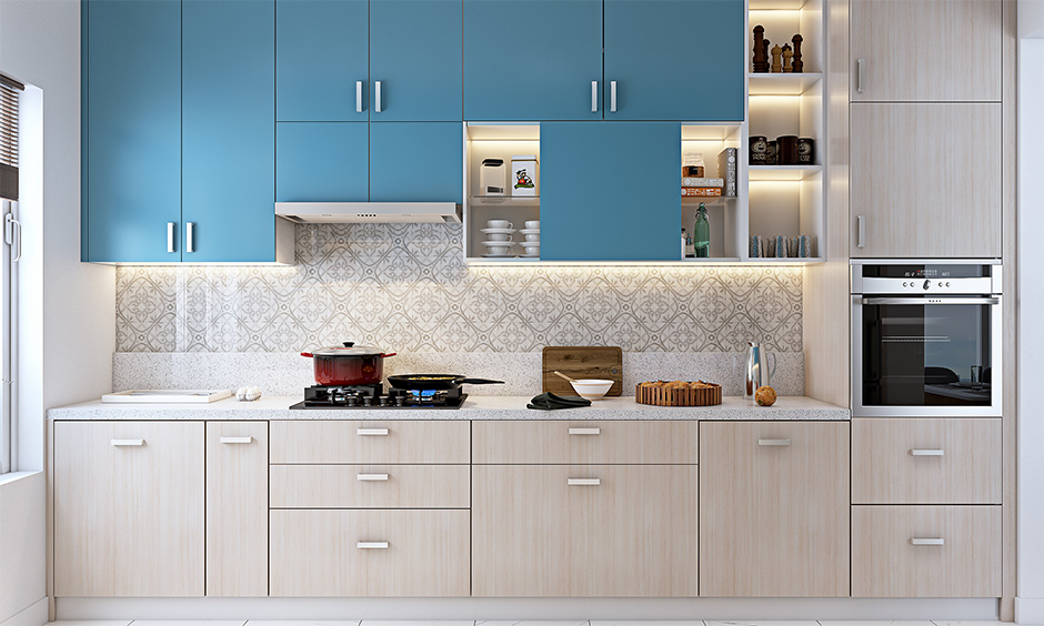 One-walled Italian modular kitchen with smart storage options keeps the kitchen clean and organised.