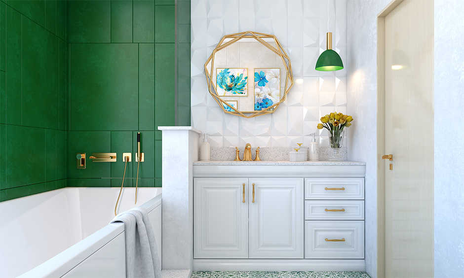 A luxury green and white bathroom with spa-like appeal with gold-finish fixtures