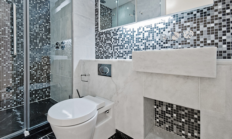 Bathroom tile 2021 trend, The bathroom has mosaic tiles that give the space an exotic appeal.