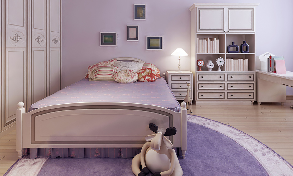 Old-style furniture in purple wall color combinations in the bedroom creates a dreamy ambience.