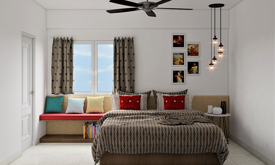 The grandparents’ bedroom design with a reading nook next to the window is perfect for reading.