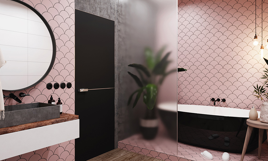 The bathroom has pink pattern tiles in a honed finish is the bathroom tile design trends for 2021.