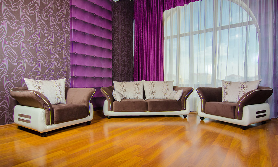 Cushioning in purple wall colour combinations with grey wallpaper in the living room looks vintage-style drama.