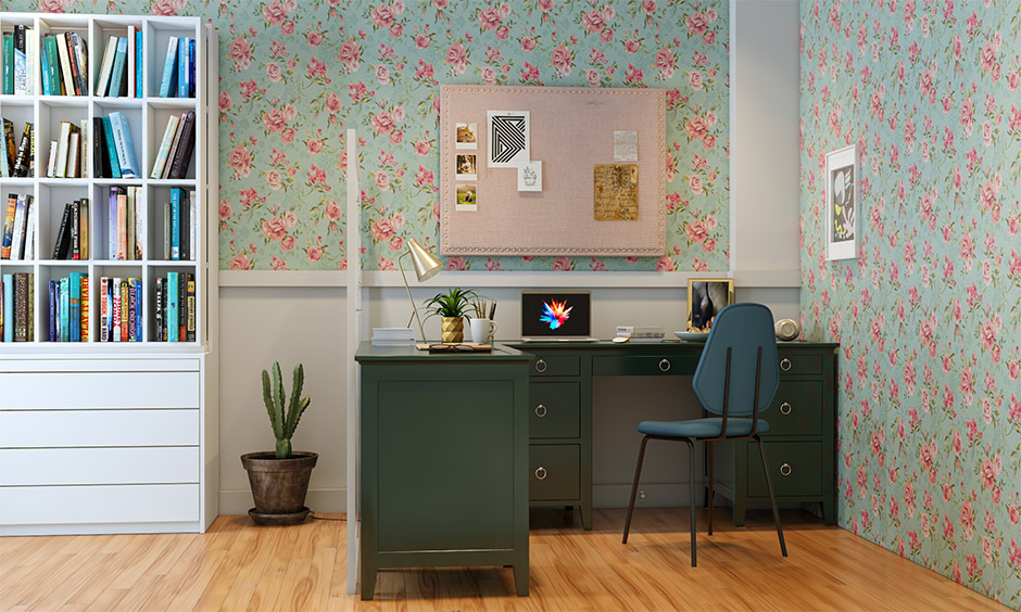 Study room design for girl, Room designed in floral patterned wallpaper and green L-shaped desk is clutter-free study nook.