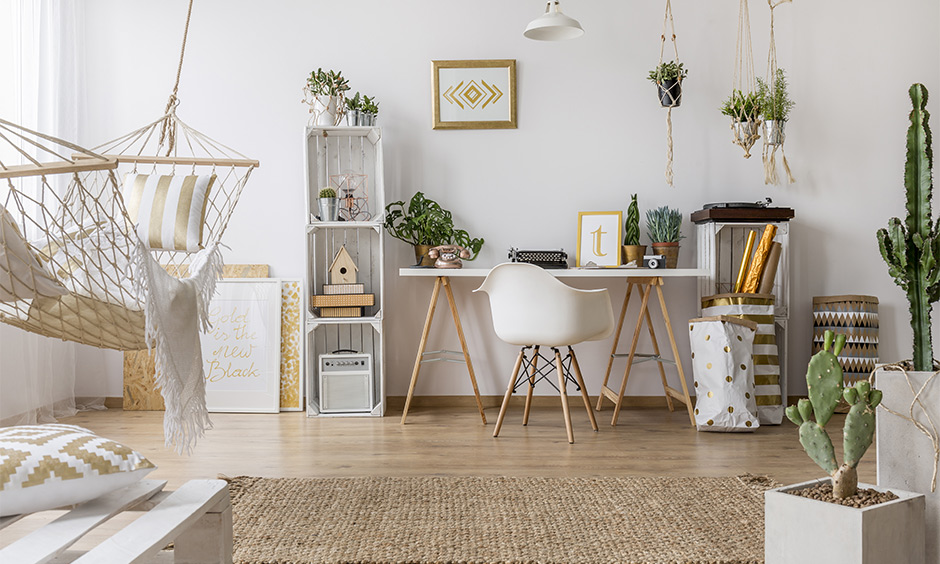 Teenage girl study room designed with DIY shelves, hammock and hanging planters bring out the Boho vibes.