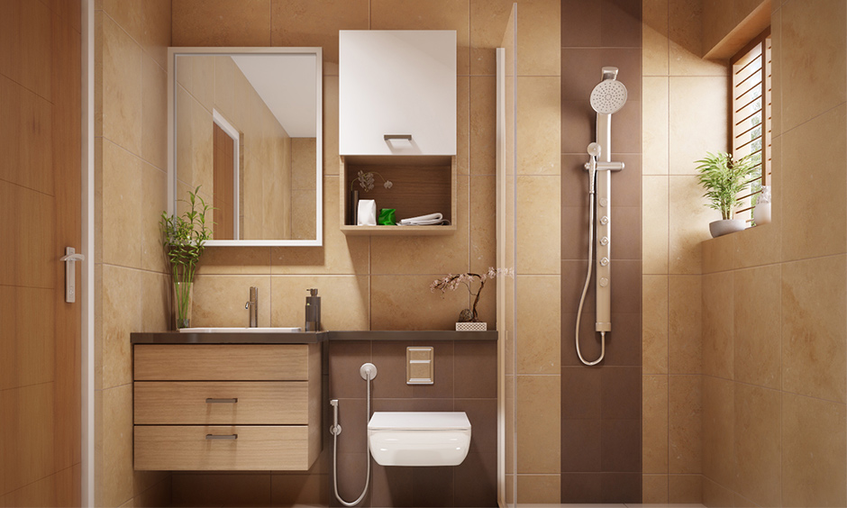 Bathroom in zen concept interior design with wooden vanity drawer and earth colour wall tiles gives an earthy look.