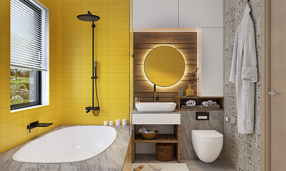 2021 bathroom colour trend, Yellow and white tiles give a vibrant look to the bathroom with lighting.