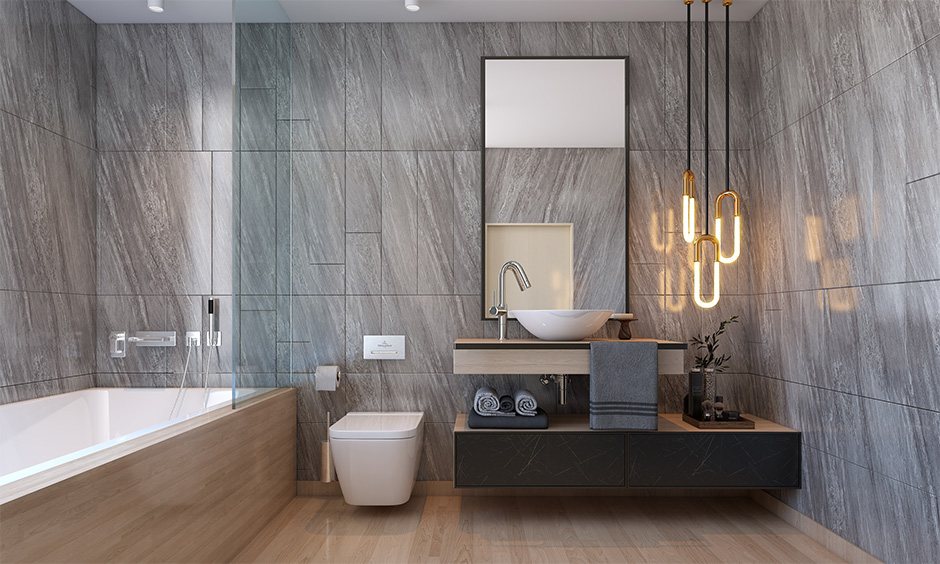 2021 bathroom design trend, bathroom with hanging pendant lights brighten up space beautifully and enhance the look.