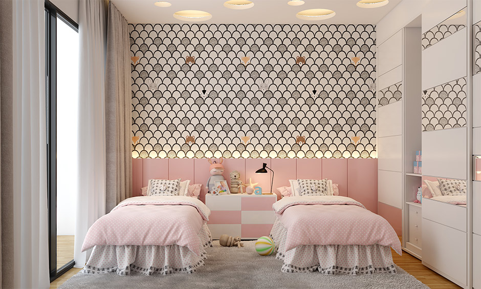 Cool kids bedroom colour in pink and white with vivid pattern lends vibrancy to space.