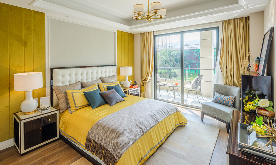 Fragmented yellow bedroom decor on different elements