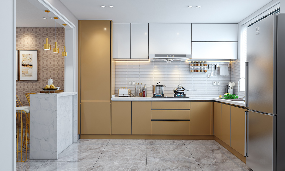 Indian kitchen design simple with natural stone flooring and countertop brings in a luxe look to space.