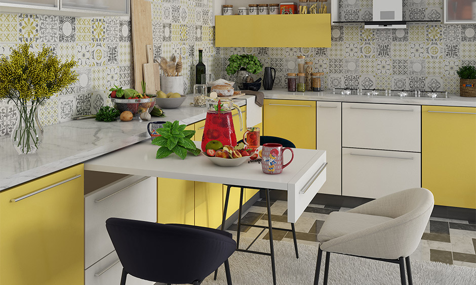 Indian kitchen design with a pull-out breakfast countertop, and it can double up as a chopping board.