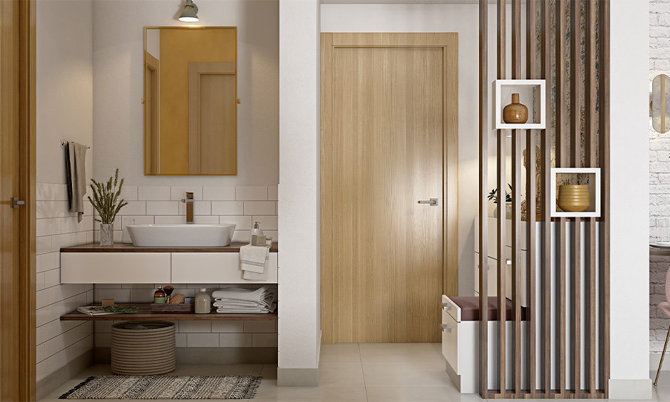 Main door panelling design in simple light oakwood laminated adds character and clean look.