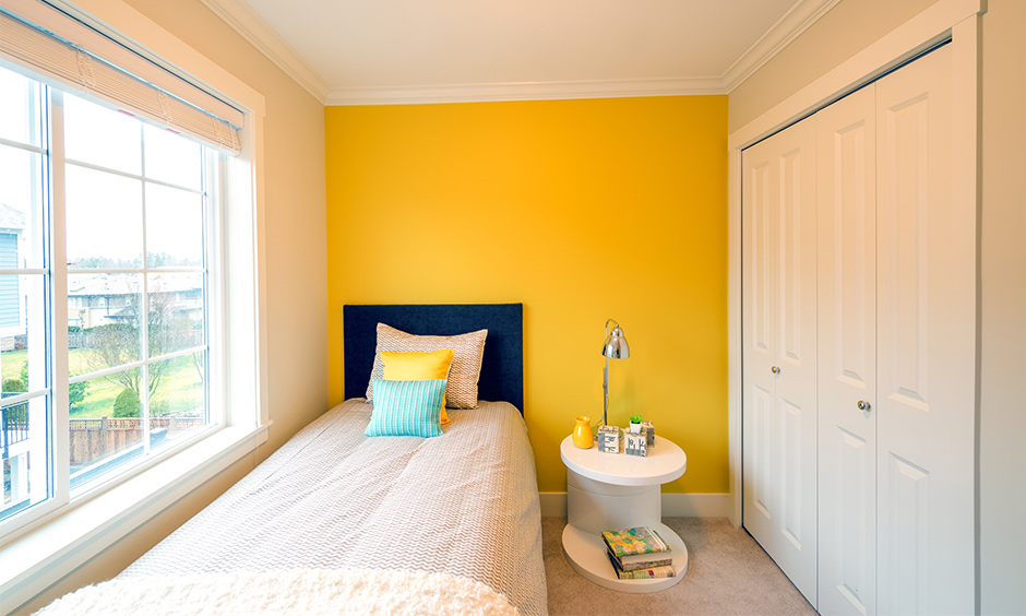 Navy and Yellow bedroom decor for small spaces