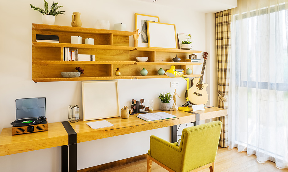 Study room wall decorating idea, Wall-mounted open shelves act as storage and lend a chic look to space.