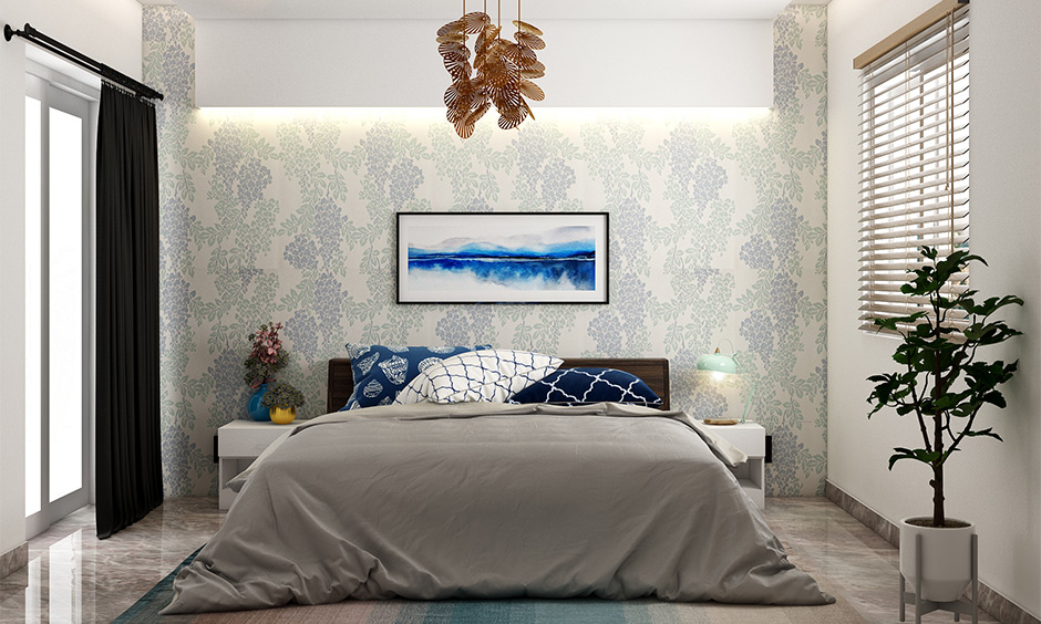 A low-budget simple house design with wallpaper in the bedroom looks more timeless