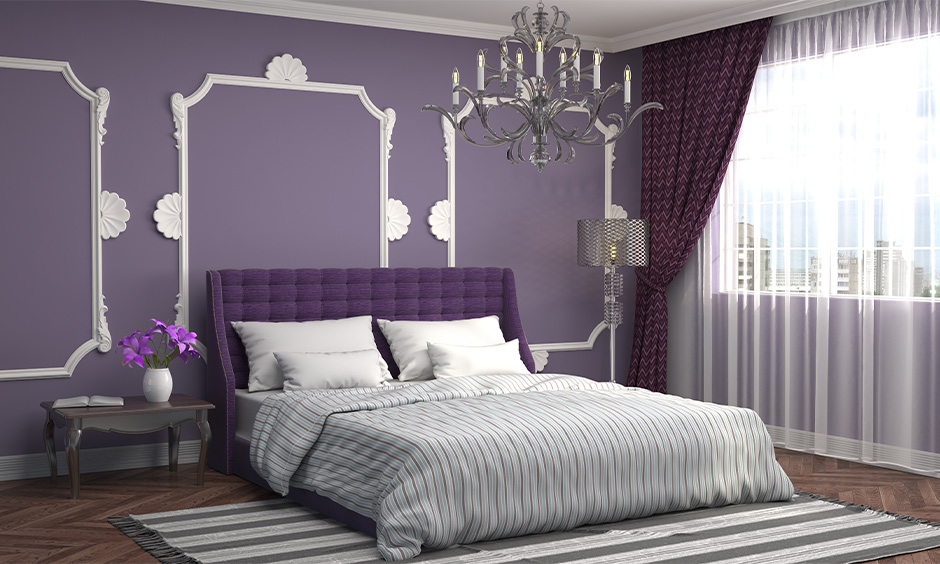 Purple two colour combination for bedroom walls with mouldings