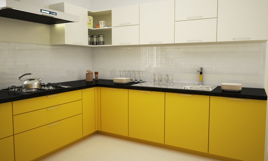 A simple kitchen design for a middle-class family in India with bright colours is enough to draw attention.