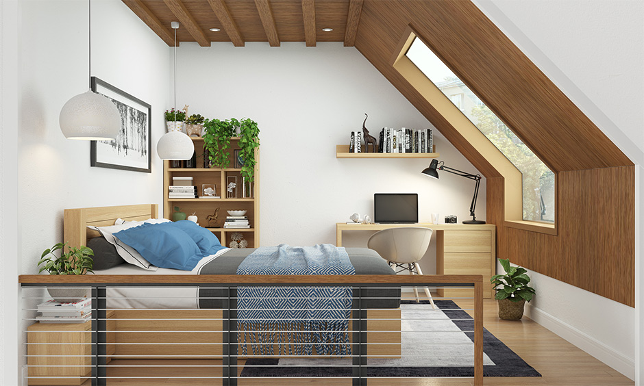 Wooden modern attic bedroom has a home office, open bookshelf, pendant lights and indoor plants.