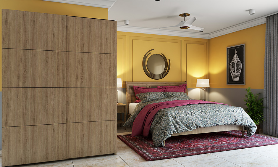 Bedroom in yellow grey colour combination wall perfectly balances bright shades and lends vibrant.