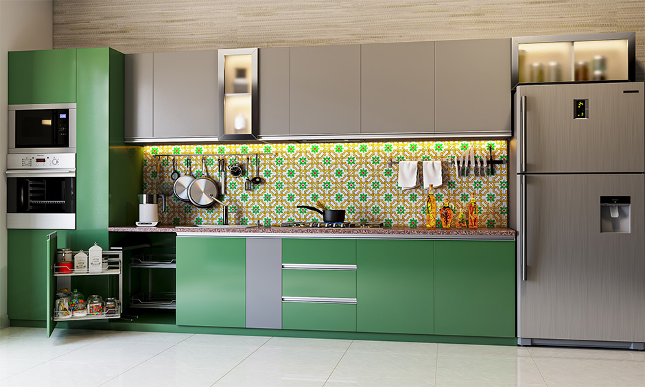 Bright and vibrant grey modular kitchen designed with emerald green and grey kitchen colors