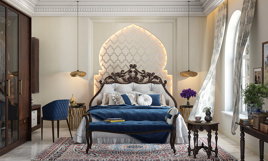 Moroccan interior bedroom has dark wood furniture, coffee table and rug in Persian-style.