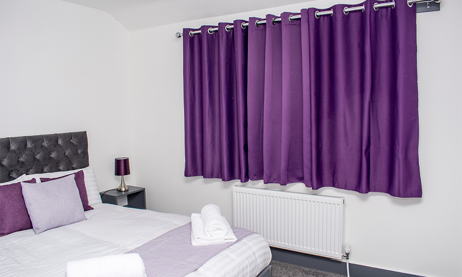 Dark purple curtains for bedroom for increased vibrancy which pop of fun and vibrant colour