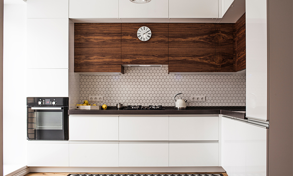 Modern twist french kitchen with white laminate french kitchen cabinet aesthetics takes over the space.