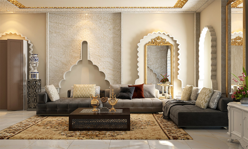 Moroccan style interior living room with large sofas and mirrors in golden frames adds an elegant touch.